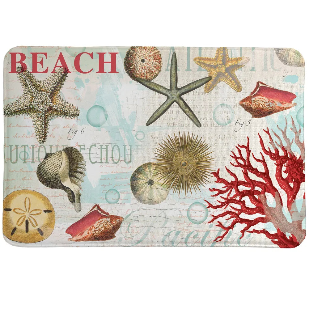 Dream Beach Shells Memory Foam Rug features finely drawn shells and coral are scattered among bubbles. 