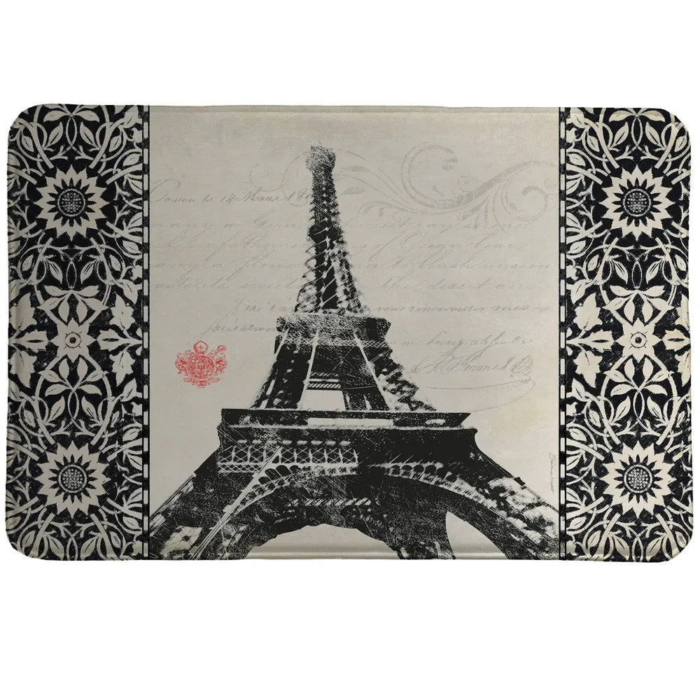 Eiffel Tower Memory Foam Rug features a bold black Eiffel Tower with handwritten script and design accents.