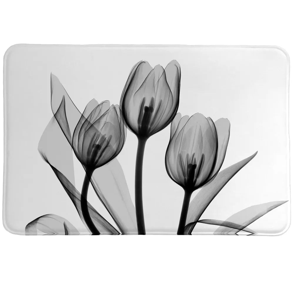Monochromatic Black Tulips Memory Foam Rug features a calming, beautiful floral image made with a special technique using an x-ray machine and a cluster of flowers.
