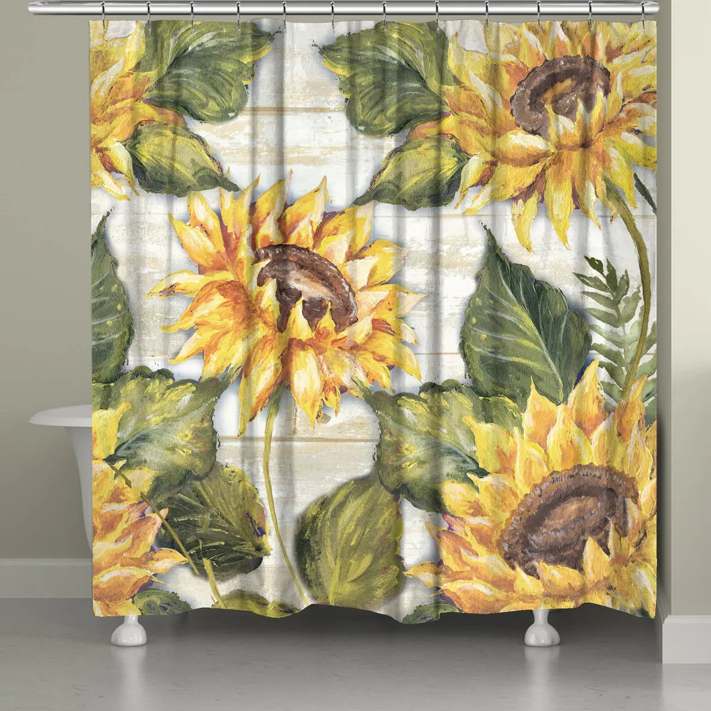 The "Sunflowers On Shiplap Shower Curtain" displays printed oversized sunflowers from original hand painted artwork. The soft, oversized florals displayed on a soft cream shiplap wood texture reveals a sophisticated artful taste that is sure to bring life to any bathroom space!