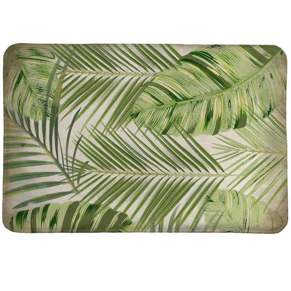 Tropic Palms Memory Foam Rug features tropical leaves set in bright greens.