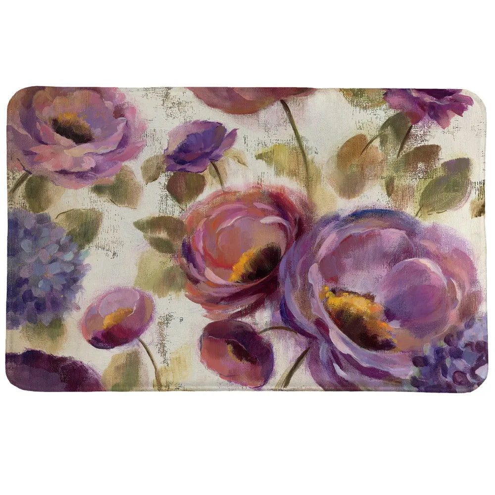 Precious Purples and Blues memory foam rug features a serene floral design with lively roses and hydrangeas in deep violet and blue hues on a textured, beige background.