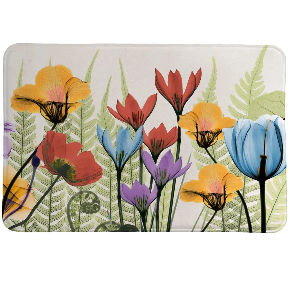 Flourishing Botanicals Memory Foam Rug features a beautiful floral arrangement created using a special technique using an x-ray machine and flowers. 