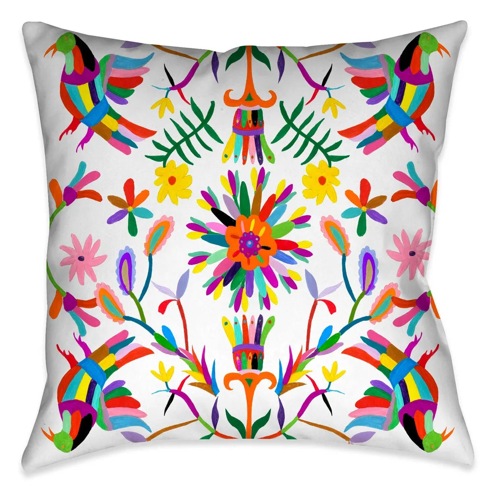 This beautiful contemporary folk-art inspired decorative pillow, celebrates inspired motifs from the Otomi region of Mexico. The pops of color in the floral and animal imagery against the white background enhances the festive traditional aesthetic and vibrancy of these culturally inspired motif.