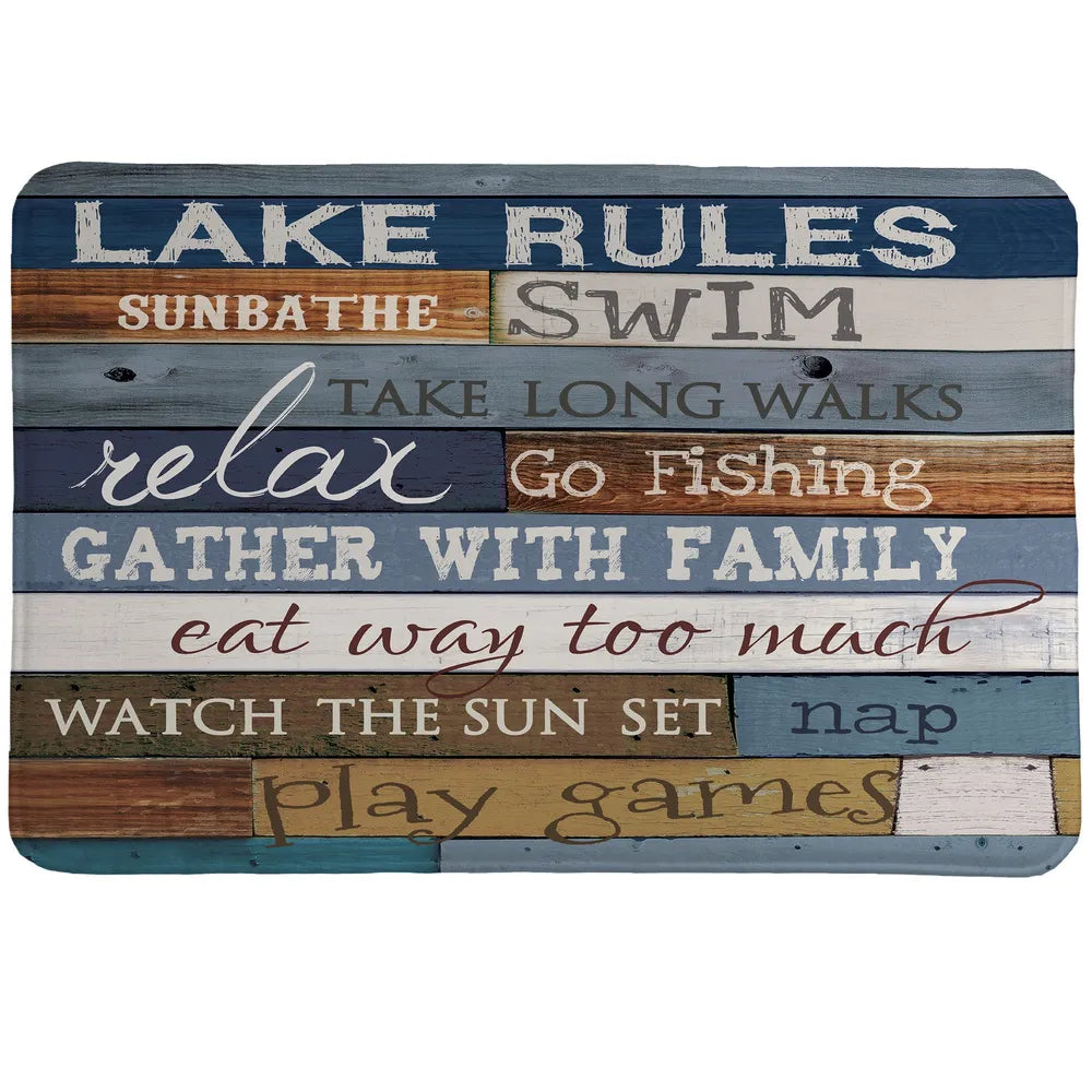 Lake Rules Memory Foam Rug features a salvaged wood backdrop and showcases the perfect lake mantra.