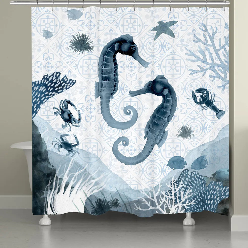 The "Moroccan Marina Shower Curtain" features seahorses and jellyfish on a printed indigo tonal pattern combining beautiful Moroccan inspired mosaic tiles with interlacing coastal scenic motifs. This trendy watercolor coastal series is a sophisticated deep sea concept that is sure to enhance your home decor. 