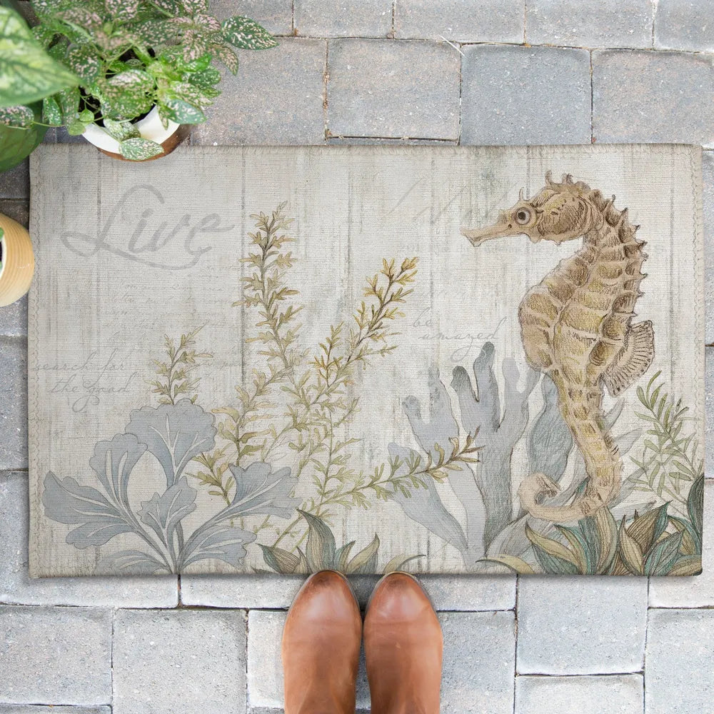 https://lauralhome.com/cdn/shop/products/SeahorseSeaweed_1024x1024_SmallOutdoorRug_1600x.jpg?v=1684450110