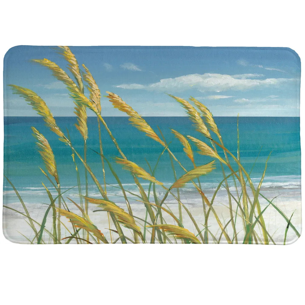 Summer Breeze Memory Foam Rug shows a picture-perfect, relaxing beachside setting marked by sand and sea. 