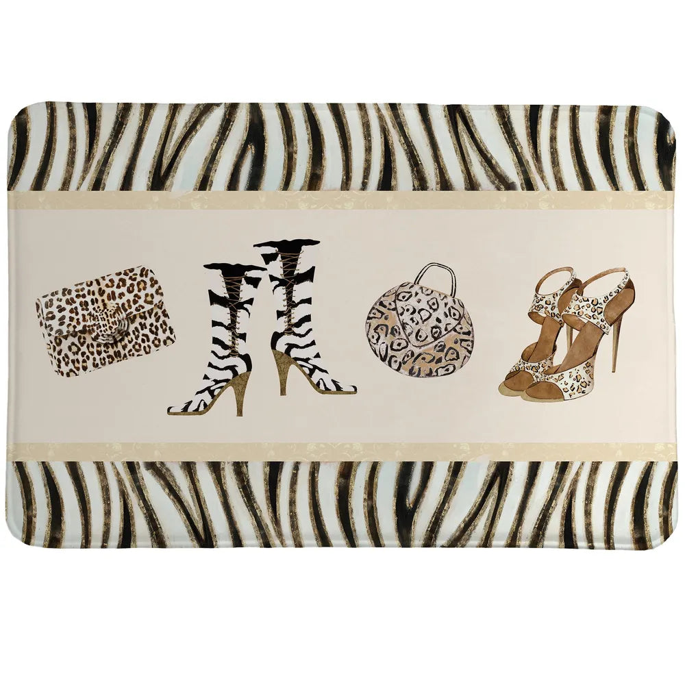 Wild for Fashion Memory Foam Rug showcases stylish shoes and purses set on a zebra background.
